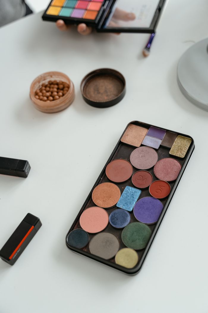 A vibrant makeup palette with various colors, ideal for eye and face makeup enthusiasts.